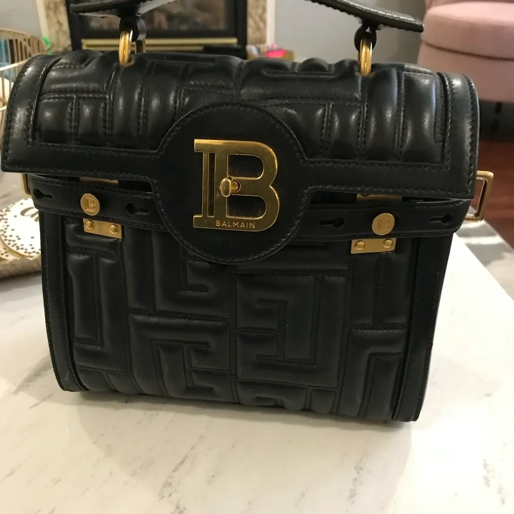 Balmain
B-Buzz 23 leather bag Black and Gold Quilted Shoulder Bag - Picture 13 of 15